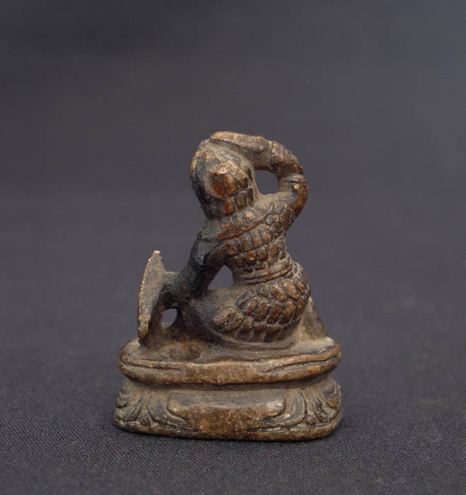 Kneeling Figure